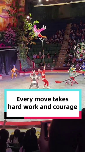 Discover China on Instagram: "An acrobat made a mistake and slipped from mid-air. Luckily, she was caught by her teammates. She then pulled herself together, tried again and succeeded!"