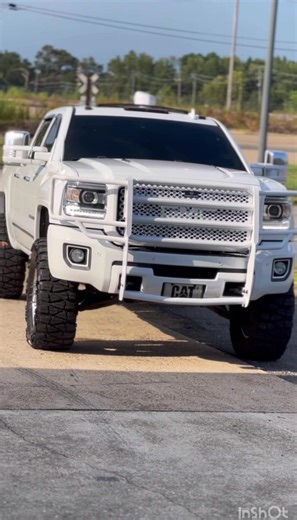 Someone tell me not to hood stack the work truck 🫣 #duramax #lml #denali #ranchhand #colormatch #cat #worktruck #grapps #leveled #leveledon37s #windowtint #fyp