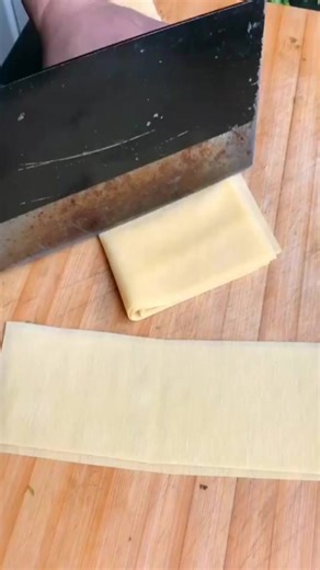 Fresh homemade lasagna sheets ready to be layered! 🍝✨ Who's hungry? #CookingAtHome #LasagnaLove | Maitilde Goeger