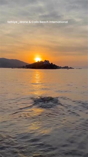 🌅 Magical Sunset in Fethiye, Turkey 🇹🇷 Experience the unparalleled beauty of a Fethiye sunset, where the golden hour kisses the turquoise waters and the mountains provide a breathtaking backdrop. This moment is pure peace. Dive into the stunning Aegean coast vibes! #calisbeachinternational #Fethiye #Turkey #Turkiye #AegeanCoast #Mugla #TurkishRiviera #Oludeniz | Calis Beach International