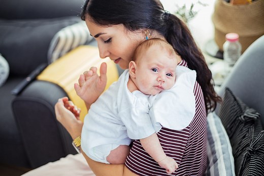 Baby osteopath demonstrates how to wind a baby for instant relief