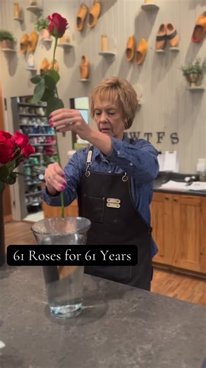 From start to finish in just 30 minutes, our designer Shirley brought this stunning bouquet of 61 roses to life, one for every fabulous year of a special birthday queen. #pellaiowa #florist #iowa #rose | Thistles