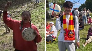 Competitors Tumble Down Hill In Hilarious Cheese Rolling Competition