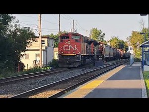 SD70M-2 duo! cn 322 rolling through st lambert