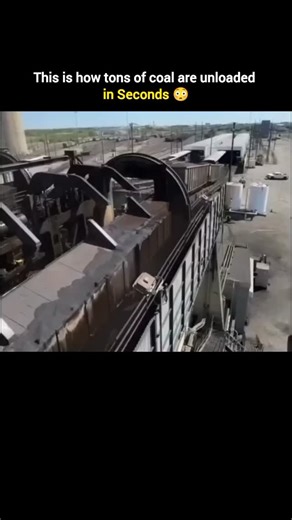 Explaining Everything on Instagram: "Coal trains don’t unload manually massive machines do the heavy lifting. Using a rotary dumper, each wagon is locked in place and rotated 180° to dump the coal in seconds. Conveyors then carry it to storage yards or power plants. This system saves time, reduces labor, and handles thousands of tons with precision. A powerful look at modern industrial engineering in action. Copyright . . Disclaimer: All footage belongs to its rightful owners and is shared under