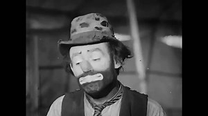 CIRCA 1940s - Clowns and a trapeze act in at the American circus in 1942.