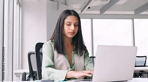 Busy professional Indian business woman manager, young female sales manager, agent or merchant using laptop computer talking on phone making call working at office or modern coworking space. Stock Video