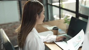 Accountant woman at desk using computer calculator for accounting. Businesswoman in workplace discussing and consult trade planning.