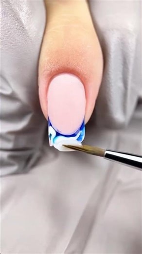 A nautical-themed nail design