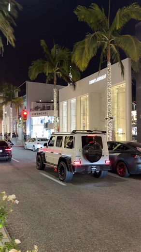 A Brabus-modified Mercedes-Benz G63 was seen speeding down Rodeo Drive, blending luxury SUV presence with supercar-level aggression. The Mercedes-Benz G63 has a current market value around $180,000, while a Brabus build typically pushes that figure to $300,000 depending on the package. Under the hood, Brabus upgrades can boost the twin-turbo V8 to over 700 horsepower, making this boxy SUV shockingly quick off the line. Despite its size and weight, a Brabus G63 can sprint from 0–60 mph in the low