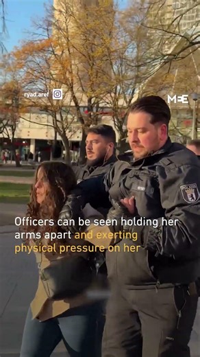 German police cover restrained protester’s mouth for chanting pro-Palestinian slogans