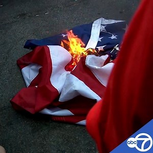 "America was never great." At Black Lives Matter Plaza on Saturday afternoon, demonstrators burned an American flag. https://bit.ly/2YZCR6L | 7News DC