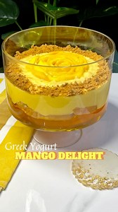 Mango yogurt delight Ingredients 750g Greek yogurt @anhaar.milk 4-5 mangoes (make pulp) 1 big tea cake 2 packs jelly @nationalfoodspakistan Mango slices for decorating the top Crushed Golden Lotus biscuits @innovative Optional: 2-3tb condensed milk 1. Make pulp of mangoes by blending them. 2. Then add the mango pulp to the greek yogurt and whisk until smooth 3. Make bottom layer of jelly. When the jelly cools down and is set then add the cake layer 4. Then add the mango yogurt layer 5. Top it of