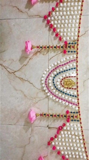 pom pom and flowers toran design