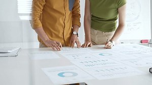 Business Professionals Reviewing Financial Charts Calculating Stock Footage Video (100% Royalty-free) 3909019725 | Shutterstock