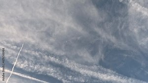 Time lapse sky blue clouds and airplane through long exposure