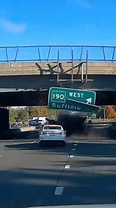 A large metal sign affidxed to the bridge was taken down by the crane. CREDITS: vastt | Dashcam Lessons