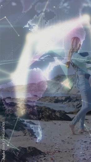 Vertical video: Mother walking beach, sparking stars into globe, mapping tech links for creators