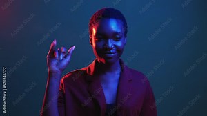 Bye gesture. Leaving farewell. See you. Red blue neon color light friendly woman waving goodbye hand isolated on dark night gif loop boomerang animation. Stock Video