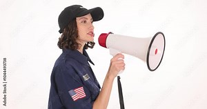 Woman police officer shouts instructions into megaphone on white background. Female speaks into megaphone to inform public about safety measures