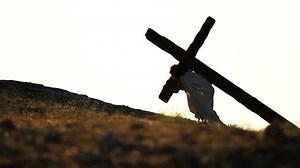 Representation of Christ carrying the cross road to Calvary hill.