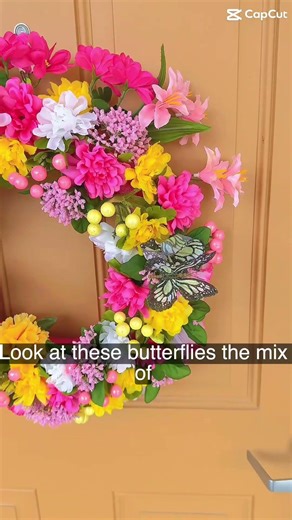 New Spring Wreath! Made with a pool noodle and flower picks #craftyhome #springcrafts