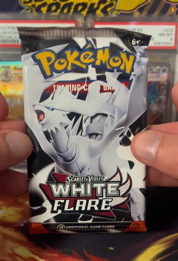 Opening a White Flare Pack for Pokémon Cards