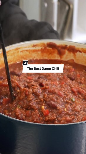 All you need to know is in the title of this recipe 🫣 The Best Damn Chili is indeed... the best damn chili. Ingredients: 4 tablespoons olive oil 1 yellow onion, chopped 1 red bell pepper, chopped 1 Anaheim chile pepper, chopped 2 red jalapeno pepper, chopped 4 garlic cloves, minced 2 ½ pounds lean ground beef ¼ cup Worcestershire sauce 1 pinch garlic powder, or to taste 2 beef bouillon cubes 1 (12 fluid ounce) can or bottle light beer (such as Coors®) 1 (28 ounce) can crushed San Marzano tomato