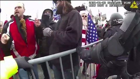 Police bodycam shows former NYPD officer Thomas Webster at the Jan. 6 Capitol riot