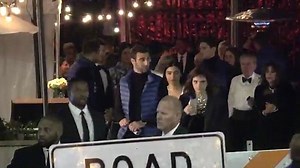 Emma Watson and Chord Overstreet outside Vanity Fair Oscar Party
