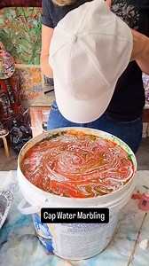 Caps are the perfect blank canvas for Water Marbling. Oh & it's very addictive 😆🙌. . . . . .#marbledesign #patterndesign #patterns #createeveryday #artfortheheart #instalove #hatporn | Raynbow Crow Studios