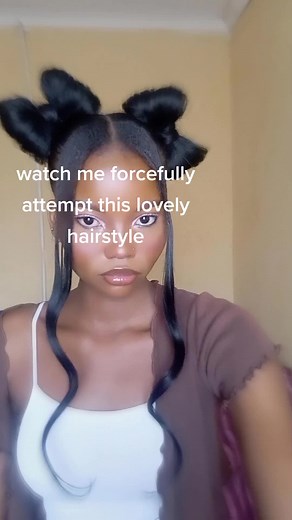 Creative Hairstyles: Easy Two Bun Tutorial with a Twist