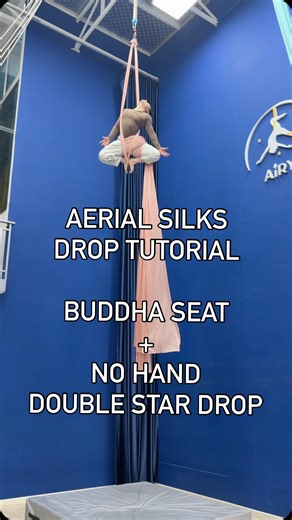 Khoa Lam | Aerial Silks Performer & Instructor 🧚🏻‍♂️ on Instagram: "Aerial Silks Tutorial: Buddha Seat + No Hand Double Star Drop Key Tips: ✅ Keep hollow back + core engaged + star position when drop back ✅ After back drop, you should actively roll the body to the star drop direction for smooth transition. In this video, I roll my body to the left. ✅ You should comfortably do the No Hand Double Star Drop well before attemping this drop. Please refer to the linked reel below for tutorial ❗️Alwa