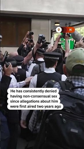 Russell Brand arrives at UK court