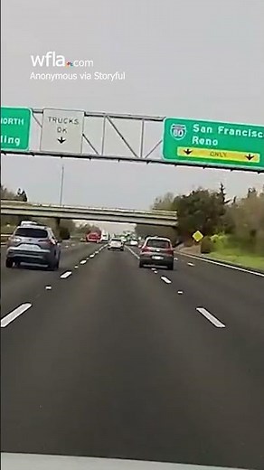 Vehicle launches off overpass, plummets onto freeway below