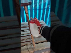 Testing Hand Held Soda Blaster with soda and plastic media on wood.