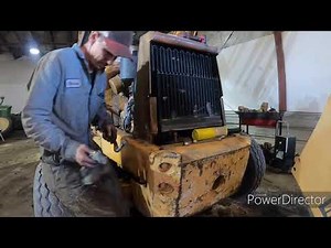 Fixing a few problems on the backhoe.