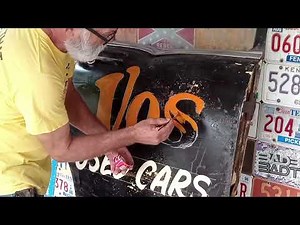 Custom Vos used cars sign