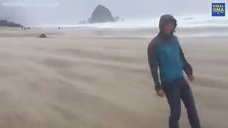 93K views · 487 reactions | WATCH: Wild video shows man standing on beach with fierce winds and sand nearly blowing him over! (WARNING: loud audio) | Good Morning America | Facebook