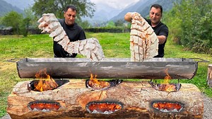 1.6M views · 29K reactions | Cooking Atlantic salmon in a huge log grill! A way of cooking like savages  #cooking #outdoorcooking #village | Wilderness Cooking | Facebook