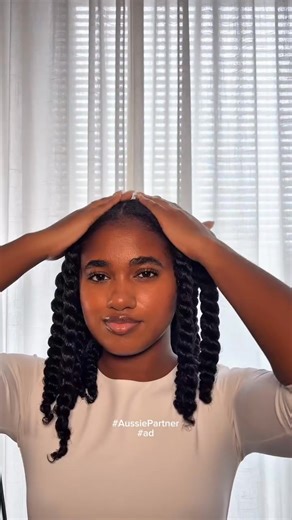 Refresh and moisturize curls with Aussie's Miracle Coils Leave-In Moisturizer, and keep them defined with Instant Freeze Sculpting Mousse. | Aussie