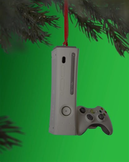 5.1K views · 40 reactions | Xbox fans, this one's for you! Light up your tree with our Xbox 360 console ornament—it even plays Halo 3 sounds!  And yes, the legendary Halo 3 game case ornament is here too.  Grab yours now: https://bit.ly/484MDXo . | Hallmark Keepsake Ornaments | Facebook
