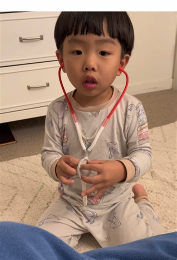 The only vet that was available after NYE party 😂 he didn’t have a nurse so he made me work. But he’s a trusted doctor. #fyp #toddler #doctor #pretendplay #pretenddoctor