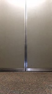 Two girls leave phone in elevator door closes, Los Angeles, CA - 30 Sep 2019