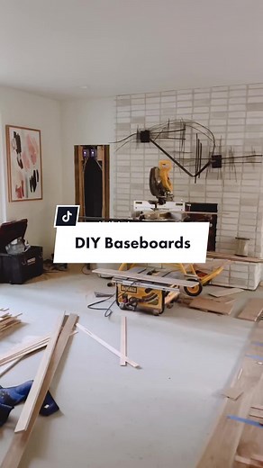 Installing baseboards is an easy and, with a few hacks, a relatively quick DIY that can save you money in a larger renovation. Spraying paint on boards before you install is also an option, but wasn’t a timing, space or weather option for us so here is how we did it! Baseboard install supply list: - Pre-primed 2” MDF baseboards - DAP extreme stretch acrylic urethane caulk - Wet wipes - Urethane paint - 1” Angled brush - 4” Foam roller - Plastic file folder - 2” painters tape Tools list: - Mitre 