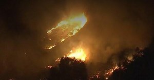 Arson suspect detained as fire rages in California