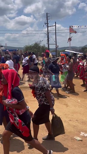 5.7K views · 54 reactions | ANNUAL MARULA FESTIVAL: On day two, members of the Lutsango Regiment have started preparations for the main day where they will dance in front of Their Majesties. Here they are seen walking back to their accommodation after receiving food and kangas (emahiya). | Times of Eswatini | Facebook