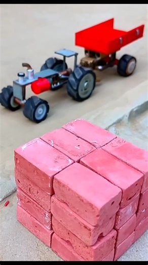 Loading bricks onto the tractor#tractor