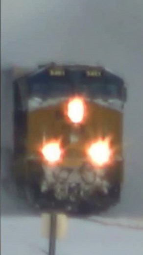 Fast CSX train dashing through the snow part one.