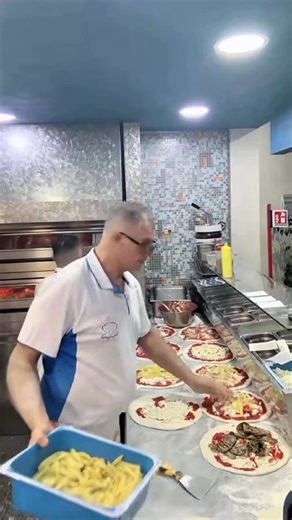 Watch this authentic Italian pizza being prepared fresh in a traditional wood fired oven! Handmade dough, rich tomato sauce, and premium toppings — true pizza kitchen vibes. #PizzaMaking #WoodFiredPizza #ItalianFood | Bang Well
